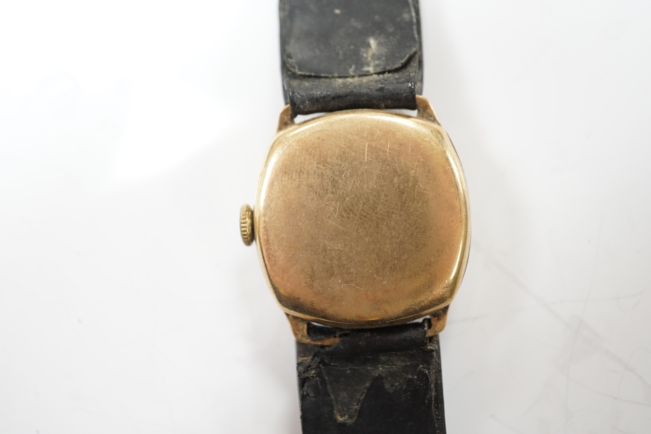 A gentleman's early to mid 20th century 9ct gold manual wind wrist watch, with subsidiary seconds, on a leather strap.